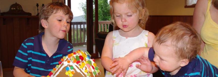 Decorating a gingerbread house